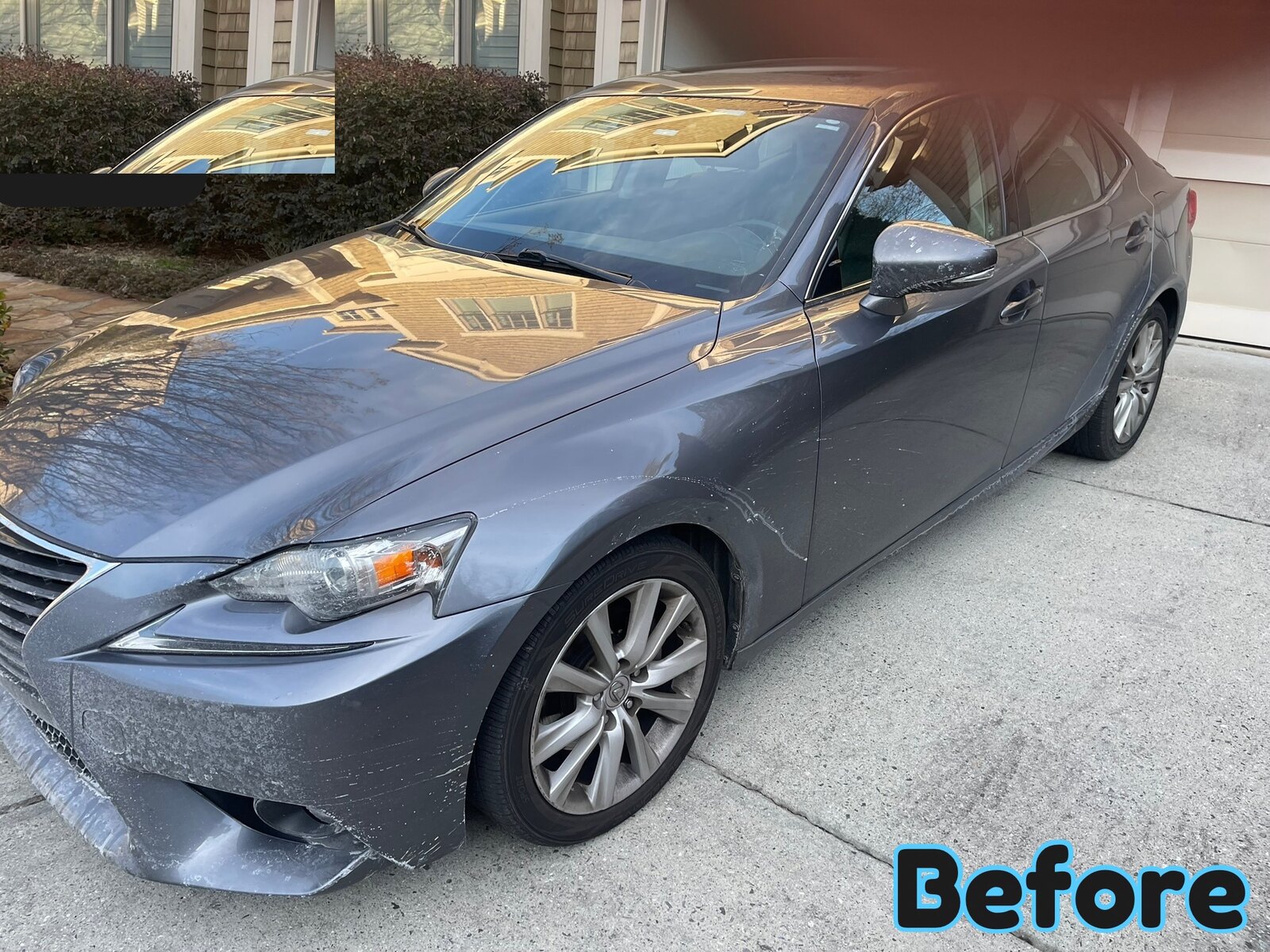 A grey Lexus sedan before detailing in Smyrna GA, with dull paint and water spots